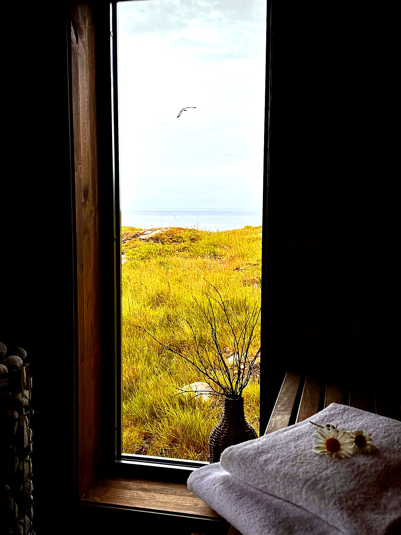 Badstue med utsikt mot havet